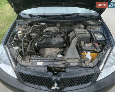 Мицубиси Лансер 2006 в Львове на Automoto.ua Синий Мицубиси Лансер, объемом двигателя 1.58 л и пробегом 420 тыс. км за 2900 $, фото 19 на Automoto.ua