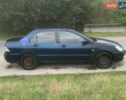 Мицубиси Лансер 2006 в Львове на Automoto.ua Синий Мицубиси Лансер, объемом двигателя 1.58 л и пробегом 420 тыс. км за 2900 $, фото 3 на Automoto.ua
