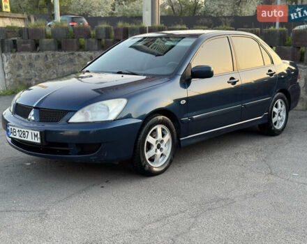 Синий Мицубиси Лансер, объемом двигателя 1.58 л и пробегом 300 тыс. км за 3650 $, фото 6 на Automoto.ua