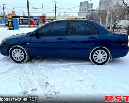 Синій Міцубісі Lancer, об'ємом двигуна 1.6 л та пробігом 185 тис. км за 4575 $, фото 3 на Automoto.ua