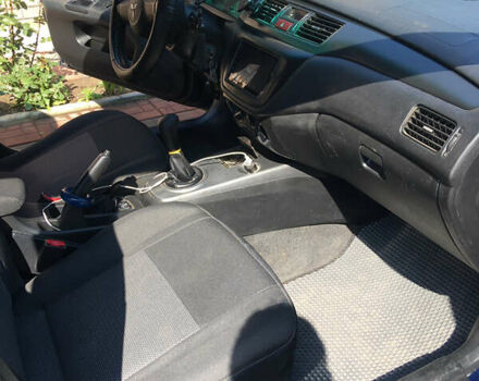 Синий Мицубиси Лансер, объемом двигателя 1.6 л и пробегом 169 тыс. км за 5100 $, фото 7 на Automoto.ua