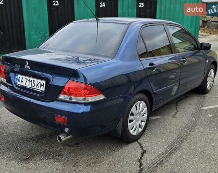 Синий Мицубиси Лансер, объемом двигателя 1.62 л и пробегом 114 тыс. км за 5200 $, фото 6 на Automoto.ua