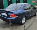 Синий Мицубиси Лансер, объемом двигателя 1.62 л и пробегом 114 тыс. км за 5200 $, фото 6 на Automoto.ua