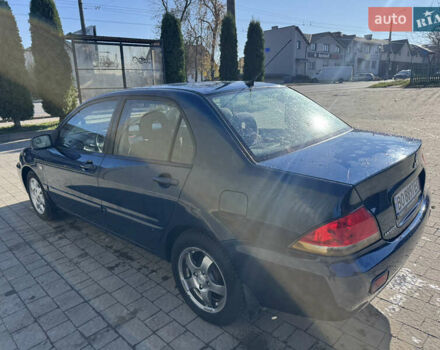 Синій Міцубісі Lancer, об'ємом двигуна 1.6 л та пробігом 148 тис. км за 3000 $, фото 2 на Automoto.ua