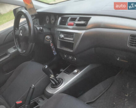 Мицубиси Лансер 2006 в Львове на Automoto.ua Синий Мицубиси Лансер, объемом двигателя 1.58 л и пробегом 420 тыс. км за 2900 $, фото 11 на Automoto.ua