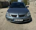 Синій Міцубісі Lancer, об'ємом двигуна 1.6 л та пробігом 244 тис. км за 4709 $, фото 1 на Automoto.ua