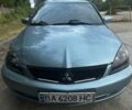 Синій Міцубісі Lancer, об'ємом двигуна 1.6 л та пробігом 266 тис. км за 4088 $, фото 1 на Automoto.ua