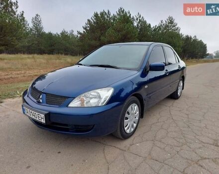 Синий Мицубиси Лансер, объемом двигателя 1.6 л и пробегом 222 тыс. км за 4599 $, фото 1 на Automoto.ua