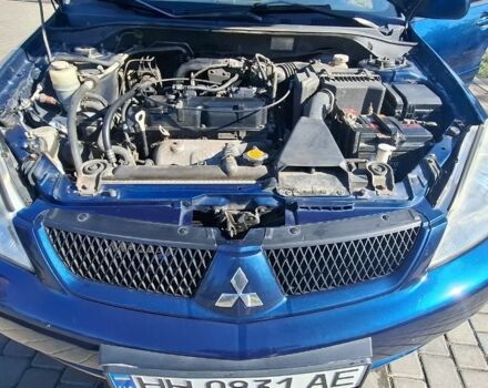 Синій Міцубісі Lancer, об'ємом двигуна 1.6 л та пробігом 267 тис. км за 3700 $, фото 3 на Automoto.ua