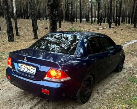 Синій Міцубісі Lancer, об'ємом двигуна 1.6 л та пробігом 210 тис. км за 3150 $, фото 8 на Automoto.ua