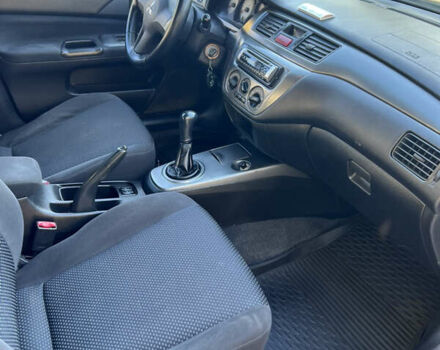 Міцубісі Lancer 2006 у Дніпро (Дніпропетровську) на Automoto.ua Синій Міцубісі Lancer, об'ємом двигуна 1.58 л та пробігом 284 тис. км за 4500 $, фото 11 на Automoto.ua
