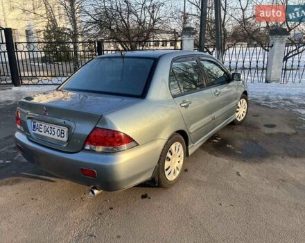 Синій Міцубісі Lancer, об'ємом двигуна 1.6 л та пробігом 172 тис. км за 5900 $, фото 9 на Automoto.ua