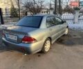 Синій Міцубісі Lancer, об'ємом двигуна 1.6 л та пробігом 172 тис. км за 5900 $, фото 9 на Automoto.ua