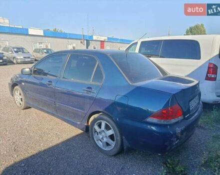 Синий Мицубиси Лансер, объемом двигателя 1.58 л и пробегом 274 тыс. км за 2650 $, фото 3 на Automoto.ua