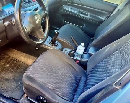 Синій Міцубісі Lancer, об'ємом двигуна 1.6 л та пробігом 273 тис. км за 3499 $, фото 4 на Automoto.ua