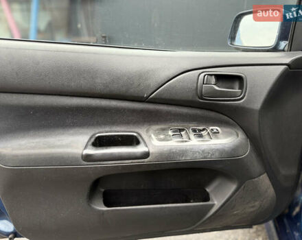 Синій Міцубісі Lancer, об'ємом двигуна 1.58 л та пробігом 513 тис. км за 2500 $, фото 18 на Automoto.ua