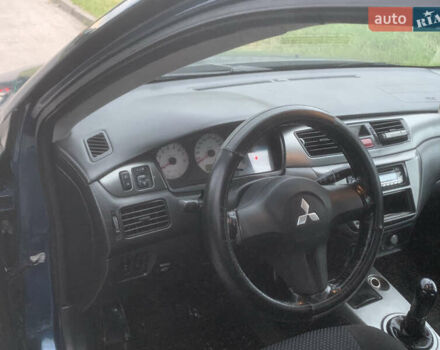 Мицубиси Лансер 2006 в Львове на Automoto.ua Синий Мицубиси Лансер, объемом двигателя 1.58 л и пробегом 420 тыс. км за 2900 $, фото 12 на Automoto.ua