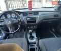 Синій Міцубісі Lancer, об'ємом двигуна 1.6 л та пробігом 172 тис. км за 5900 $, фото 12 на Automoto.ua