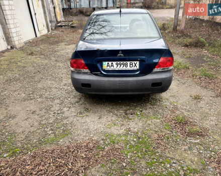 Синий Мицубиси Лансер, объемом двигателя 1.58 л и пробегом 243 тыс. км за 2900 $, фото 6 на Automoto.ua