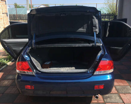 Синий Мицубиси Лансер, объемом двигателя 1.6 л и пробегом 169 тыс. км за 5100 $, фото 9 на Automoto.ua