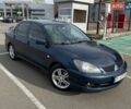 Синій Міцубісі Lancer, об'ємом двигуна 2 л та пробігом 227 тис. км за 4100 $, фото 1 на Automoto.ua