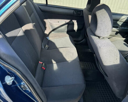 Синій Міцубісі Lancer, об'ємом двигуна 1.6 л та пробігом 148 тис. км за 3000 $, фото 17 на Automoto.ua