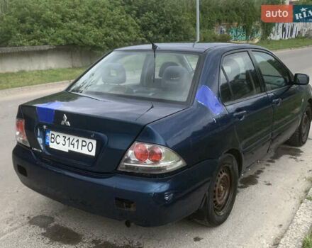 Мицубиси Лансер 2006 в Львове на Automoto.ua Синий Мицубиси Лансер, объемом двигателя 1.58 л и пробегом 420 тыс. км за 2900 $, фото 6 на Automoto.ua