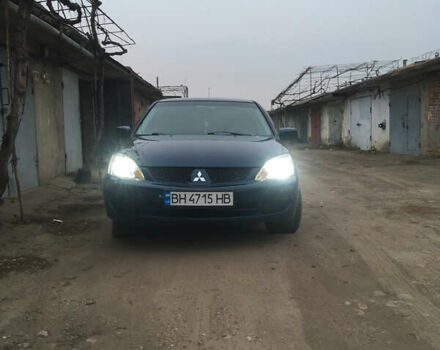 Синий Мицубиси Лансер, объемом двигателя 1.6 л и пробегом 169 тыс. км за 5100 $, фото 1 на Automoto.ua