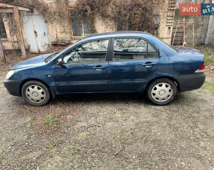 Синий Мицубиси Лансер, объемом двигателя 1.58 л и пробегом 243 тыс. км за 2900 $, фото 8 на Automoto.ua