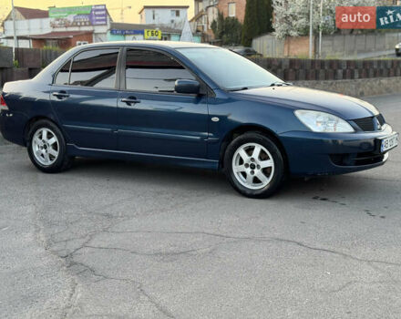 Синий Мицубиси Лансер, объемом двигателя 1.58 л и пробегом 300 тыс. км за 3650 $, фото 3 на Automoto.ua