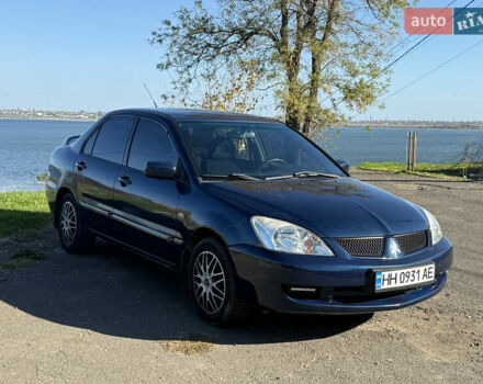 Синій Міцубісі Lancer, об'ємом двигуна 1.58 л та пробігом 269 тис. км за 3350 $, фото 2 на Automoto.ua