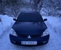Синий Мицубиси Лансер, объемом двигателя 1.58 л и пробегом 380 тыс. км за 4500 $, фото 1 на Automoto.ua