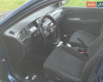 Мицубиси Лансер 2006 в Львове на Automoto.ua Синий Мицубиси Лансер, объемом двигателя 1.58 л и пробегом 420 тыс. км за 2900 $, фото 18 на Automoto.ua