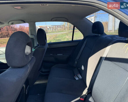 Синій Міцубісі Lancer, об'ємом двигуна 1.58 л та пробігом 269 тис. км за 3350 $, фото 17 на Automoto.ua