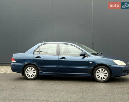 Синій Міцубісі Lancer, об'ємом двигуна 1.58 л та пробігом 513 тис. км за 2500 $, фото 8 на Automoto.ua