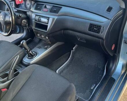 Синій Міцубісі Lancer, об'ємом двигуна 1.6 л та пробігом 172 тис. км за 5900 $, фото 11 на Automoto.ua