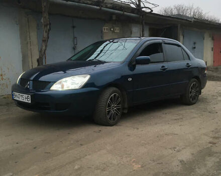 Синий Мицубиси Лансер, объемом двигателя 1.6 л и пробегом 169 тыс. км за 5100 $, фото 2 на Automoto.ua
