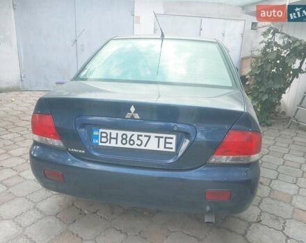 Синій Міцубісі Lancer, об'ємом двигуна 0 л та пробігом 243 тис. км за 5000 $, фото 1 на Automoto.ua