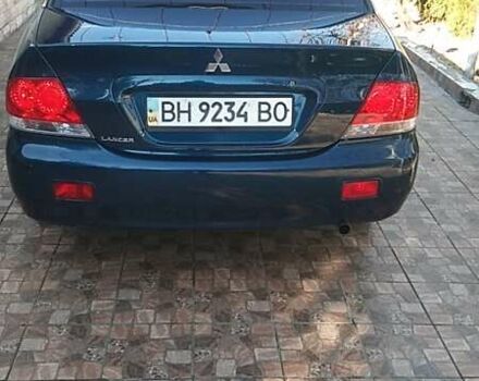 Синий Мицубиси Лансер, объемом двигателя 1.58 л и пробегом 195 тыс. км за 3990 $, фото 27 на Automoto.ua