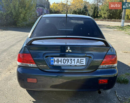 Синій Міцубісі Lancer, об'ємом двигуна 1.58 л та пробігом 269 тис. км за 3350 $, фото 6 на Automoto.ua