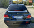 Синій Міцубісі Lancer, об'ємом двигуна 1.58 л та пробігом 269 тис. км за 3350 $, фото 6 на Automoto.ua