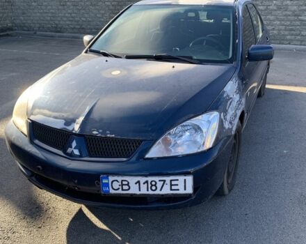 Синій Міцубісі Lancer, об'ємом двигуна 1.6 л та пробігом 242 тис. км за 2100 $, фото 1 на Automoto.ua