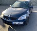 Синій Міцубісі Lancer, об'ємом двигуна 1.6 л та пробігом 242 тис. км за 2100 $, фото 1 на Automoto.ua