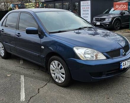 Синий Мицубиси Лансер, объемом двигателя 1.62 л и пробегом 114 тыс. км за 5200 $, фото 2 на Automoto.ua