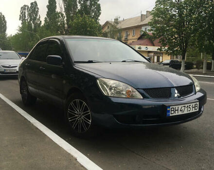 Синій Міцубісі Lancer, об'ємом двигуна 1.6 л та пробігом 169 тис. км за 5100 $, фото 10 на Automoto.ua