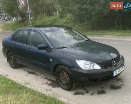 Мицубиси Лансер 2006 в Львове на Automoto.ua Синий Мицубиси Лансер, объемом двигателя 1.58 л и пробегом 420 тыс. км за 2900 $, фото 1 на Automoto.ua