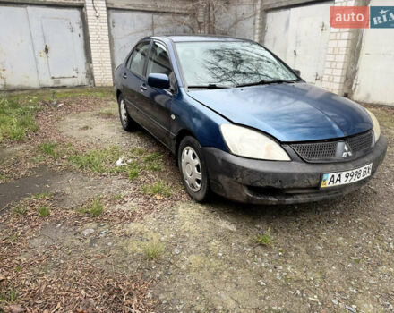 Синий Мицубиси Лансер, объемом двигателя 1.58 л и пробегом 243 тыс. км за 2900 $, фото 3 на Automoto.ua
