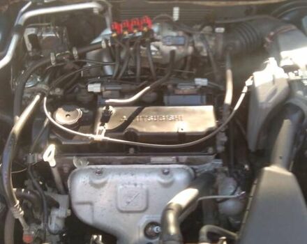 Синий Мицубиси Лансер, объемом двигателя 1.58 л и пробегом 195 тыс. км за 3990 $, фото 8 на Automoto.ua