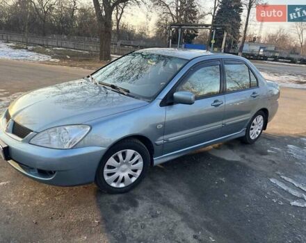 Синій Міцубісі Lancer, об'ємом двигуна 1.6 л та пробігом 172 тис. км за 5900 $, фото 6 на Automoto.ua