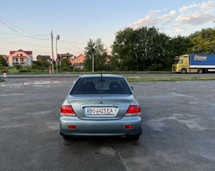 Синій Міцубісі Lancer, об'ємом двигуна 1.6 л та пробігом 237 тис. км за 4099 $, фото 5 на Automoto.ua